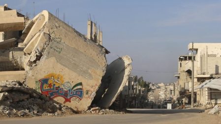 The word ‘Steadfast’ as graffiti on a damaged building in Deraa. Photo Wsam Almokdad/Reuters